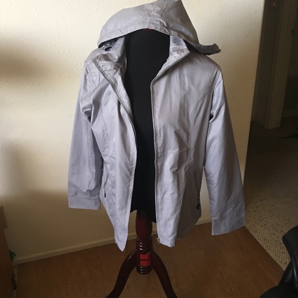 Grey hooded wind breacker